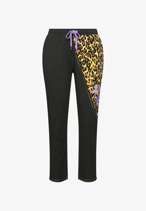 Black sweatpants with leopard print panel on one side, purple drawstring, and floral embroidery detail. Soft fabric and tapered fit.