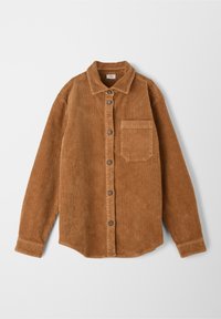 Camicia in velluto a coste marrone con chiusura a pulsante, maniche lunghe, colletto e tasca sul petto. Presenta una texture a coste verticali e un orlo arrotondato.