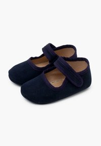 Ballerines en tissu bleu marine avec un bout rond et une sangle élastique. Texture douce et semelle intérieure rembourrée pour un confort optimal.
