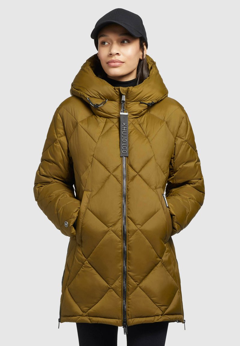 Olive green quilted puffer coat with a hood, full zip closure, and interior drawstring. Features side pockets and a textured pattern.