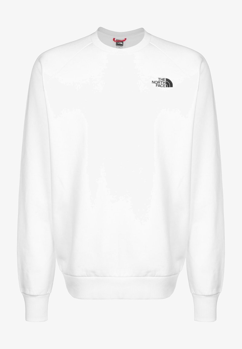 Sudadera blanca con mangas raglán largas, puños y bajo de canalé, que presenta un pequeño logotipo negro en la zona del pecho izquierdo. Textura de tela suave.