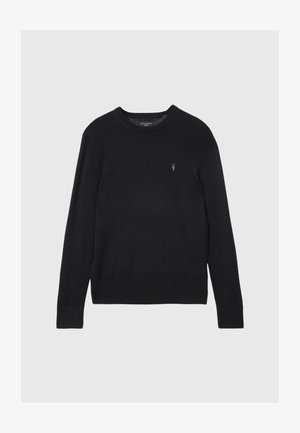 Svart strikket genser med rund hals og lange ermer, med en liten brodert logo på brystet, samt ribbestrikket kant og mansjetter.