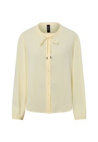 Żółta bluzka z szyfonu z długimi rękawami, okrągłym dekoltem, zapięciem na guziki oraz wiązaniem przy kołnierzu. Miękka tekstura i lekka konstrukcja.