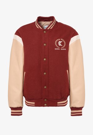 Sarkans vilnas universitātes žakets ar beigtu ādas piedurknēm, ribinātu apkakli, svītrainām aprocēm un zeltītām pogām. Satur izšūtu logo uz krūškurvja.