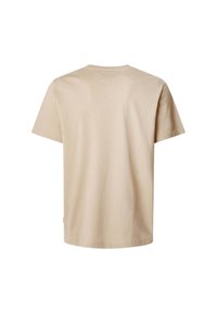 Smėlio spalvos medvilninis marškinėliai su klasikiniu apvaliu kaklu ir trumpomis rankovėmis. Lygi tekstūra, tiesi forma ir minimalus ženklinimas šone.