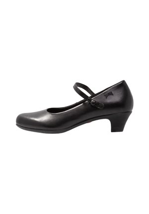 Schwarze Leder-Mary-Jane-Schuhe mit runder Zehenform, niedrigem Absatz und einem Riemen über dem Spann. Glatte Textur mit einem subtilen Glanz und Logo-Detail.