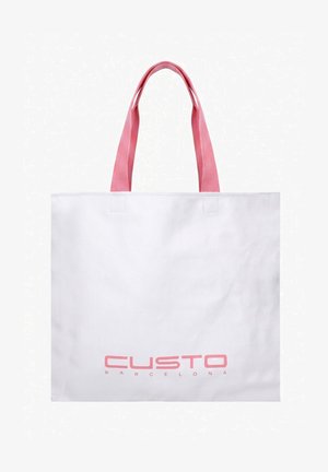 Borsa tote bianca con manici rosa e scritta rosa "CUSTO BARCELONA" stampata al centro in basso.