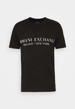 Black cotton T-shirt featuring the text "ARMANI EXCHANGE MILANO / NEW YORK" in white, with a classic crew neck and short sleeves.