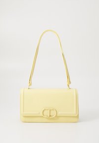 Yellow leather handbag with a rectangular shape, a smooth texture, and a front clasp. Features a single adjustable strap and stitched accents.
