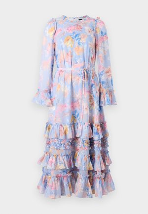 Vestido de mangas longas floral em azul claro com mangas assimétricas e babados em camadas. Apresenta um laço na cintura e um vibrante padrão floral em cores pastéis.