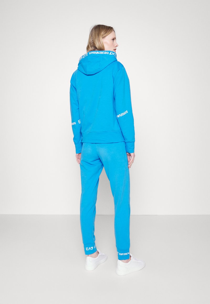 EA7 Emporio Armani TRACKSUIT SET Tracksuit brilliant blue/blue Zalando.de