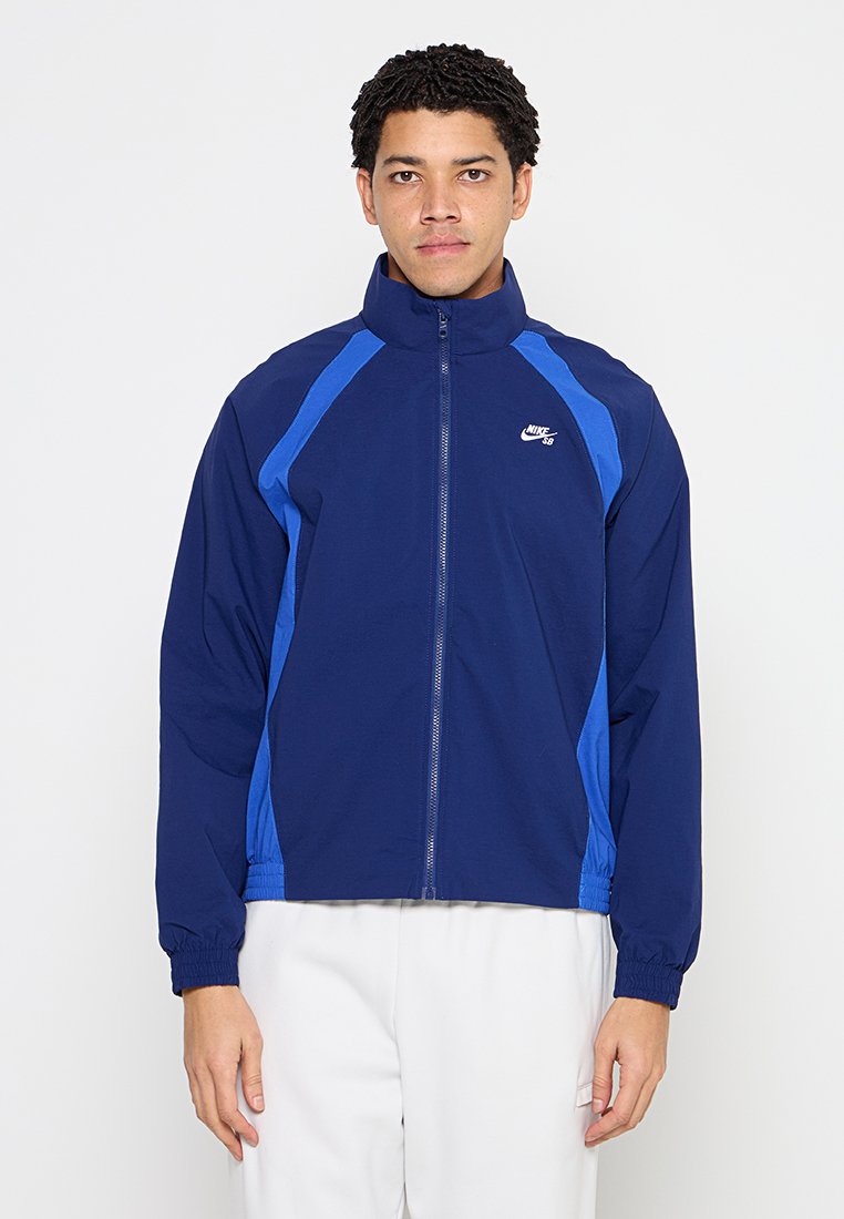 Nike Performance Lichte jas blauw Nike Performance Lichte jas blauw