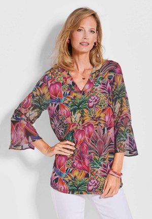 Bloemige, doorzichtige blouse met een levendig patroon in roze, groen en gele tinten. De V-hals en bellmouwen maken het ontwerp compleet.