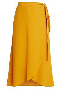 Gonna avvolgente gialla realizzata in tessuto leggero, caratterizzata da un nodo laterale, una silhouette fluida e un orlo asimmetrico.