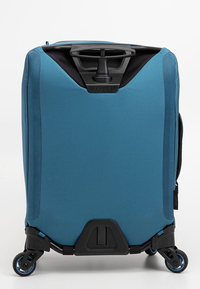 Blauer Rollkoffer mit hartem Gehäuse, einem ausziehbaren Griff, vier Rädern und einer strukturierten Oberfläche. Der Markenname "Osprey" ist oben zu sehen.