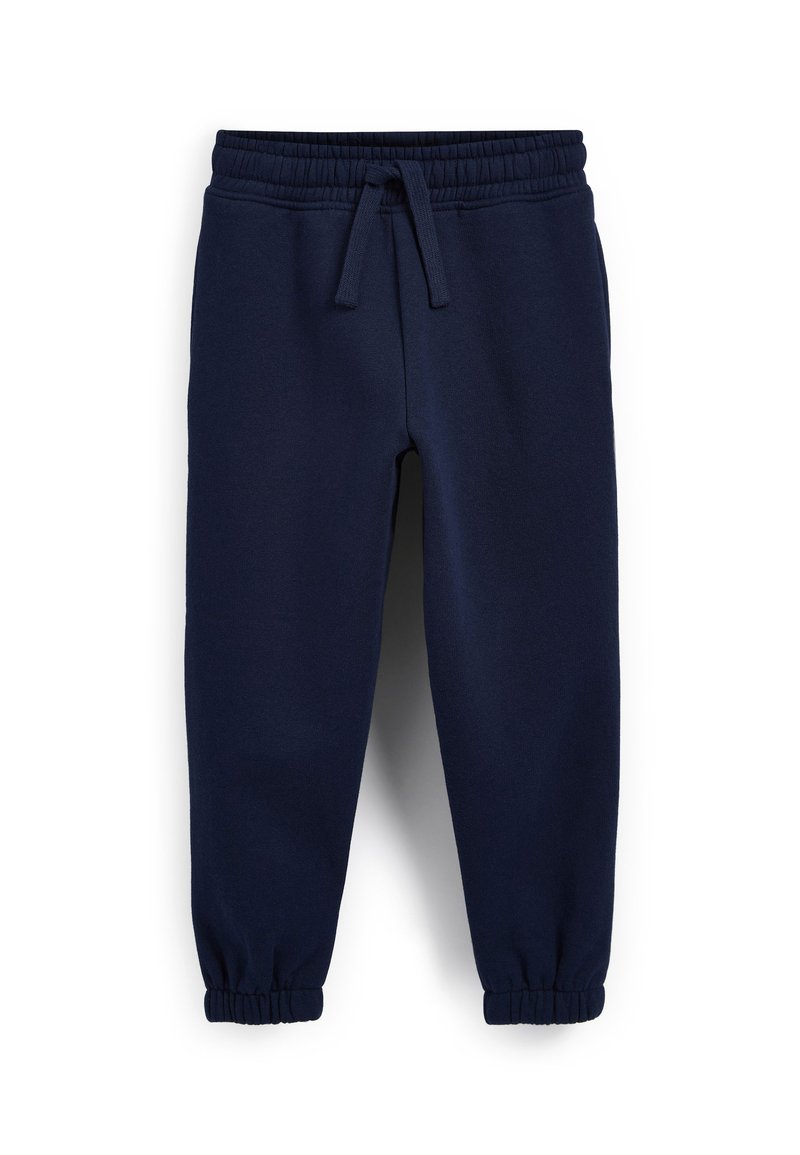 Marineblå sweatpants lavet af blødt stof, med en elastisk talje og snøre, samt elastiske manchetter ved anklerne.