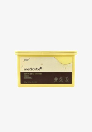 Contenant jaune de Medicube Deep Vita C Daily Quick Mask avec vitamine C et niacinamide, marqué pour ses bienfaits hydratants et pour une peau éclatante.