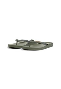 Green flip-flops featuring a textured sole, thin glittering strap with gold accent, and a minimalist design.