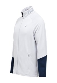Hvid zip-up jakke med høj krave, der har marineblå accenter på ærmerne. Fremstillet af glat stof; logo på kraven. En lynlås lomme på siden.