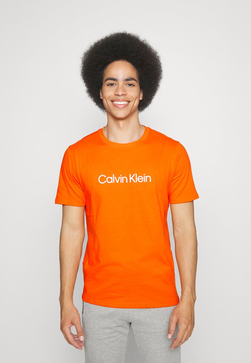 Calvin Klein Performance Sports Tshirt red orange/orange Zalando.co.uk