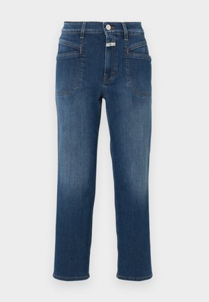 Sinised teksapüksid sirge säärega, ees nööpide ja tõmblukuga sulgur, nurga all asetsevate esitaskutega ja oranži õmblusega.