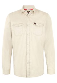 Beige langärmliges Hemd aus Baumwolle mit Knopfleiste, zwei Brusttaschen und abgerundetem Saum. Mit Kragen und Logo-Tag ausgestattet.