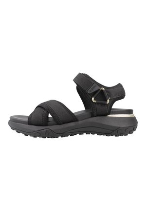 Sandalias negras con múltiples correas elásticas, una plantilla acolchada y una suela de goma texturizada. Presenta un acento metálico decorativo en el talón.