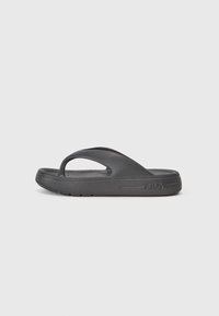 Sorte slip-on sandaler med gummisåle, som har et minimalistisk design, en enkelt tåpost og en teksturert fotseng for bedre grep.