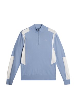 Hellblauer Pullover mit halbem Reißverschluss und Kragen, mit weißen Seitenpanelen und einem kleinen Logo auf der Brust. Glatte Textilstruktur.