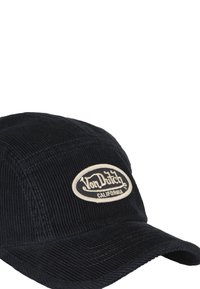Casquette en velours côtelé noir avec une couronne arrondie, une visière rigide et un patch ovale beige portant les inscriptions « Von Dutch » et « California ».