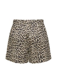 Shorts en imprimé léopard avec une taille élastique, en tissu beige et à pois noirs. Comprend des ourlets repliables et des poches latérales.