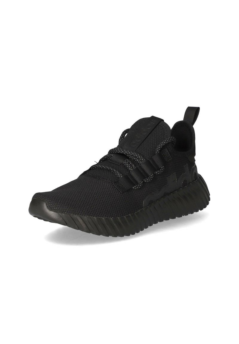 Black athletic shoe with a mesh upper, elastic lace design, and textured rubber sole. Features a pull tab on the heel and subtle branding.