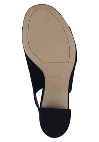 Sandalo con tacco in suede nero, caratterizzato da punta arrotondata e fianchi aperti. Presenta una suola in gomma beige liscia e il logo del brand impresso sulla suola.