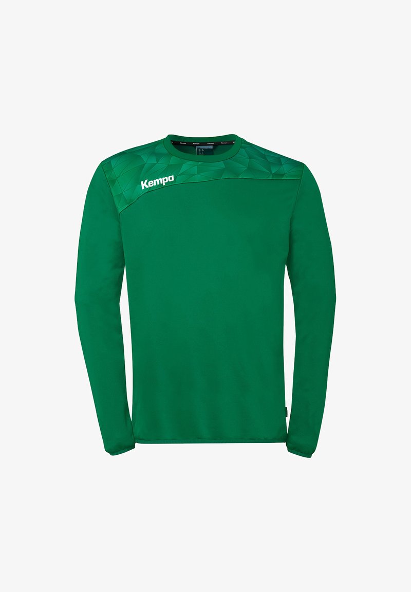T-shirt de sport à manches longues vert avec un motif géométrique sur les épaules et le logo "Kempa" sur la partie supérieure de la poitrine.