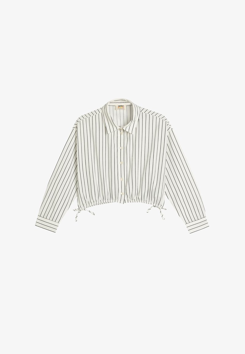 Cropped, white button-up shirt with black vertical stripes. Features a collar, long sleeves, and adjustable ties at the hem. Textured fabric.