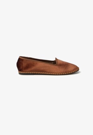 Brown velvet slip-on shoe with rounded toe, elasticized collar, and a textured, stitched sole. Smooth surface and slightly shiny finish.