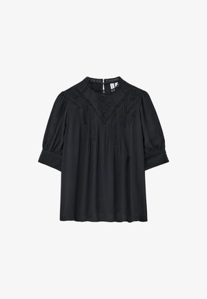 Black blouse with a round neckline, short puffed sleeves, and intricate floral embroidery along the yoke and sleeves. Smooth texture.