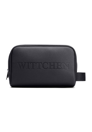 Černá obdélníková kožená toaletní taška s raženým nápisem "WITTCHEN", zapínáním na zip a textilním bočním poutkem.