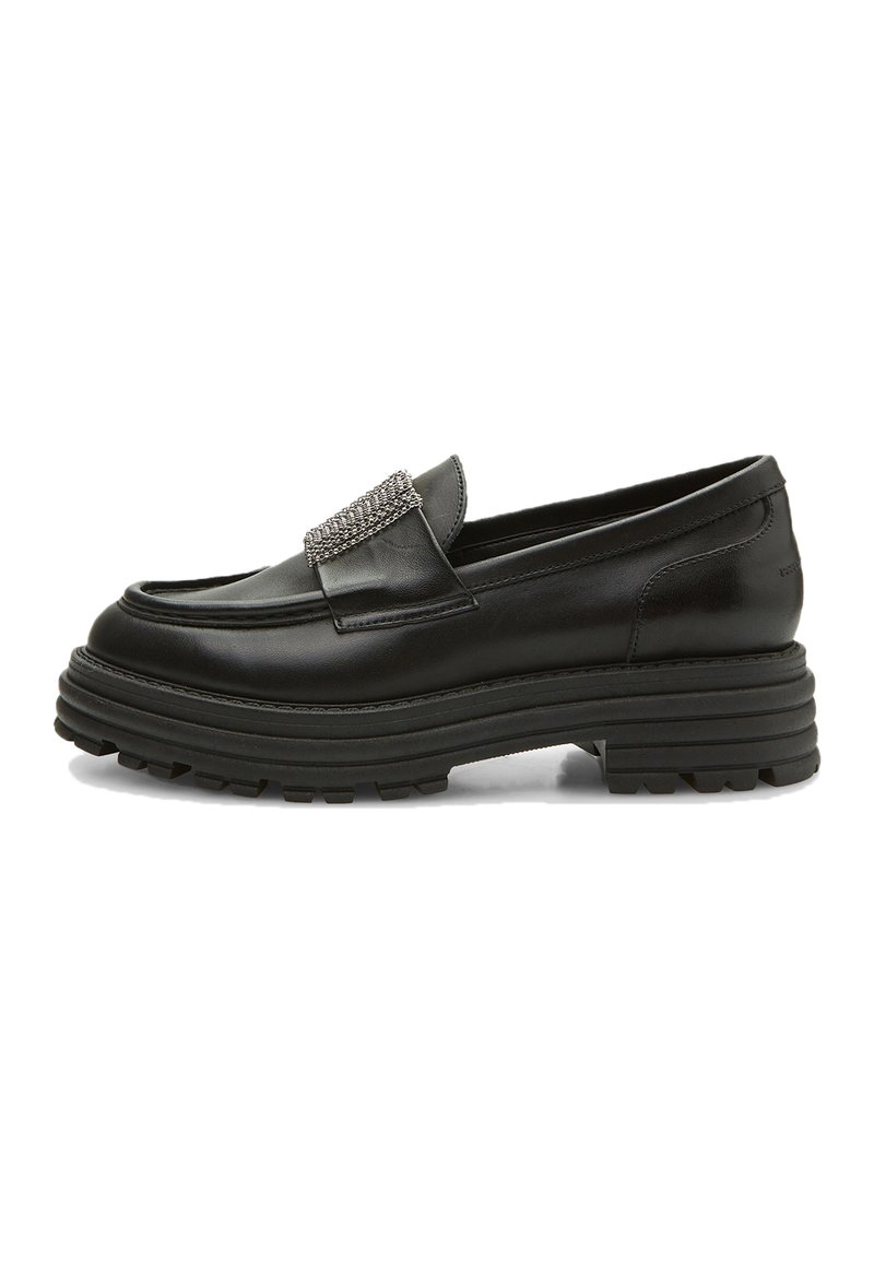 Black leather loafers with a rounded toe, featuring a silver chain accent on the front and a thick, textured rubber sole.