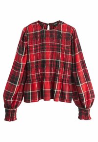 Blouse à carreaux rouges avec corsage smocké, manches ballon longues et détail en forme de trou de clé au dos. Le tissu a une texture douce avec des lignes noires et blanches contrastantes.