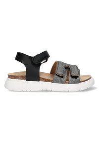 Sort og sølv glimmer sandal med justerbar rem, kork fodseng og hvid gummi sål med et tekstureret mønster.