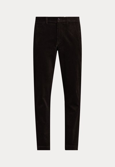 Črne kordurojske hlače s slim fit krojem, ki imajo zapiranje na gumb, zanke za pas in vertikalno rebrasto teksturo na tkanini.