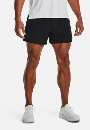 Zwarte atletische shorts met een gladde textuur, gedragen met een wit atletisch shirt en witte sneakers. Heeft een klein logo op de shorts.