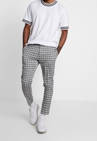 River Island Tygbyxor - black