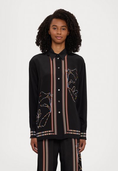 Black long-sleeve shirt with colorful floral embroidery, vertical striped accents, and button closure. Smooth fabric with a relaxed fit.