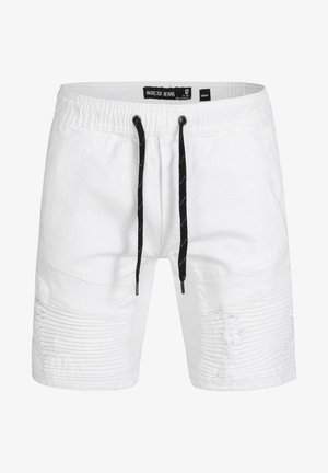 Weiße Jeansshorts mit elastischem Bund, schwarzen Kordeln, akzentuierten Rippstrukturen und distressed Details an der Seite.