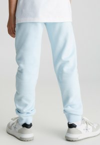 Calvin Klein Jeans Träningsbyxor - keepsake blue