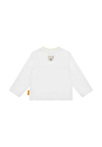 Weißes Langarmhemd aus Baumwolle mit Rundhalsausschnitt und einem hellgelben Besatz. Es hat eine kleine Bärenstickerei auf dem Rücken und ein seitliches Etikett.