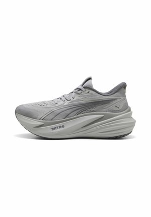 Light gray athletic running shoe with thick cushioned sole, textured upper, laces, and "NITRO" branding on midsole.