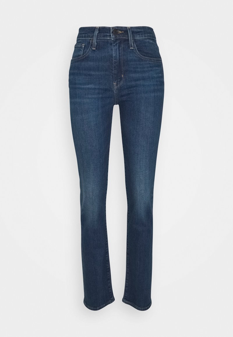 Jean en denim bleu foncé avec une coupe droite, taille haute, design à cinq poches et détails de couture discrets sur la ceinture.